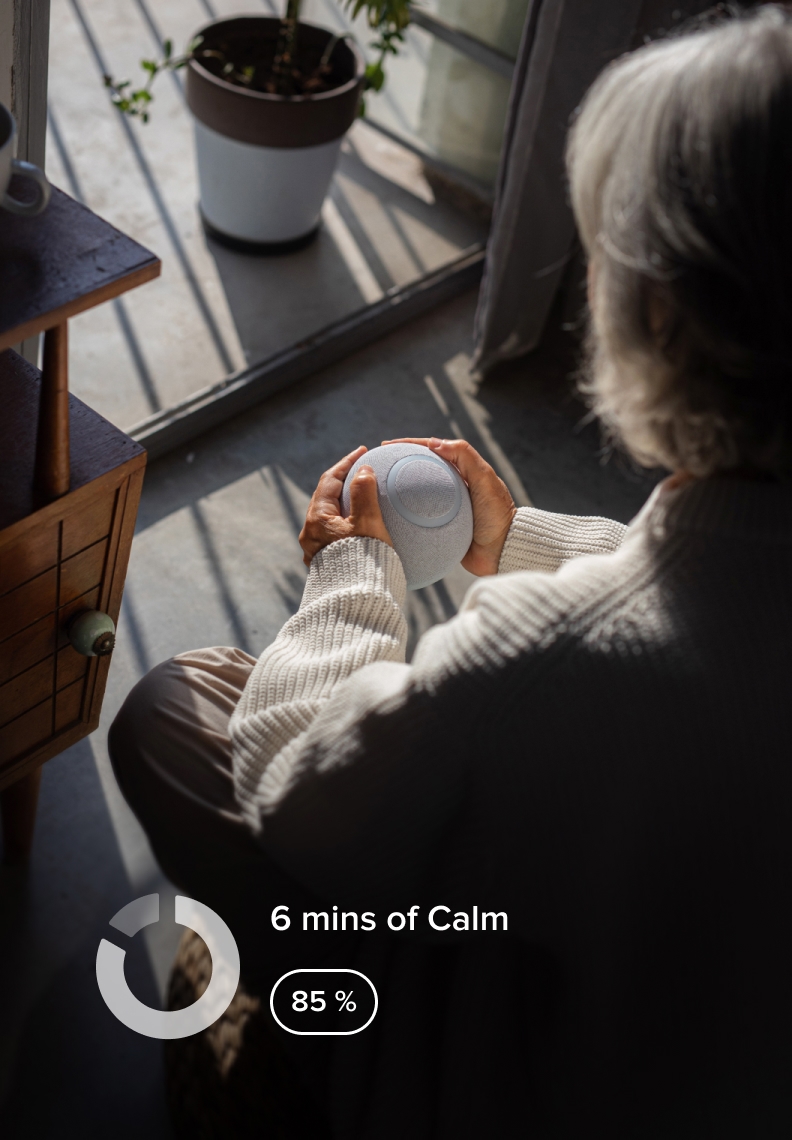 Woman doing meditation with the Orb