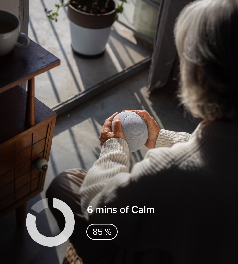 Woman doing meditation with the Orb