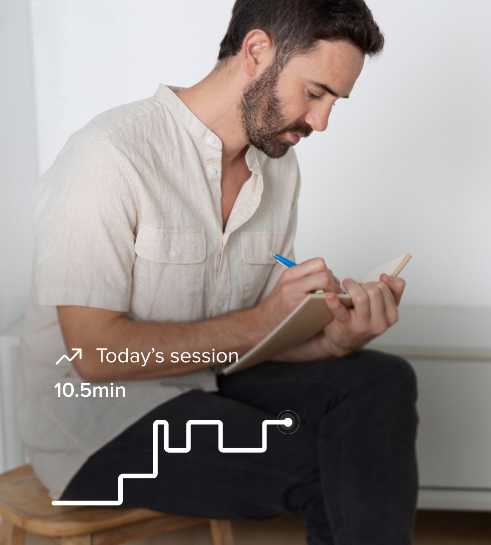 Man writing in a notebook